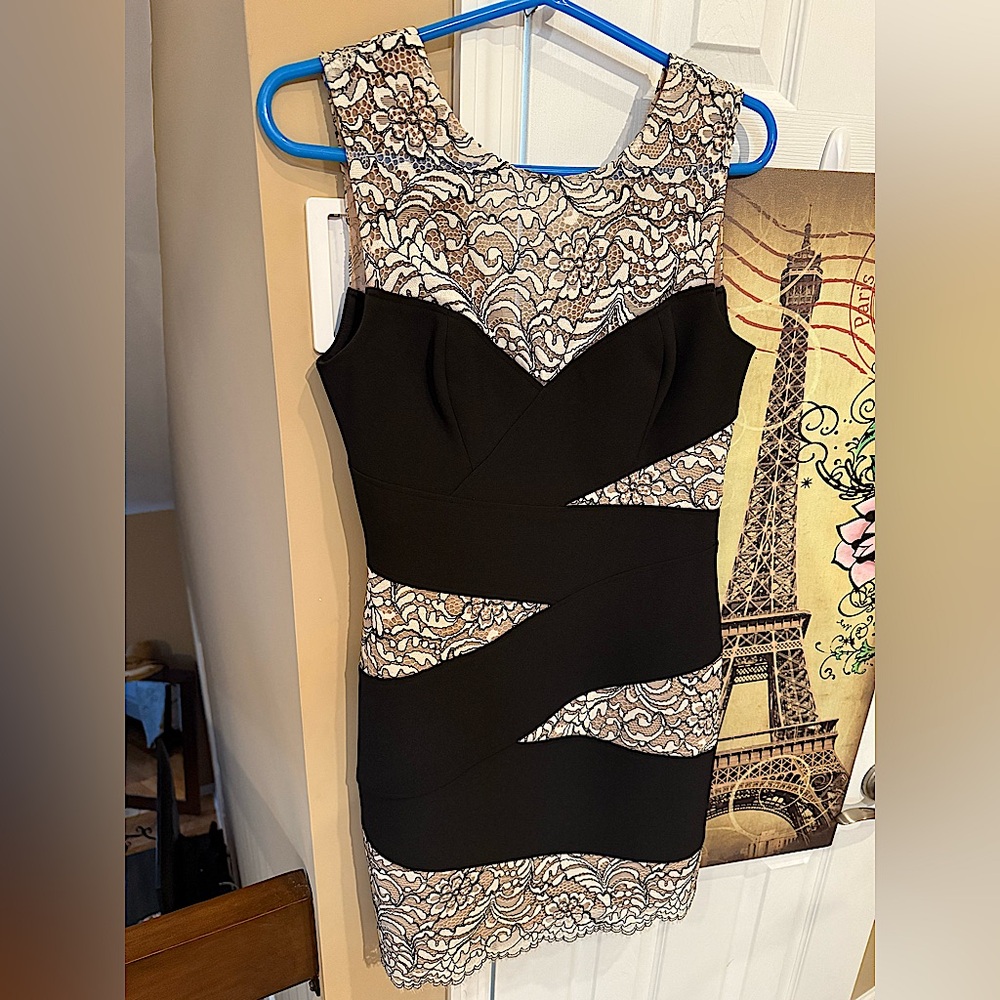 BCBGMAXAAZRIA midi dress.
Sheek and classy style made for special occasions!